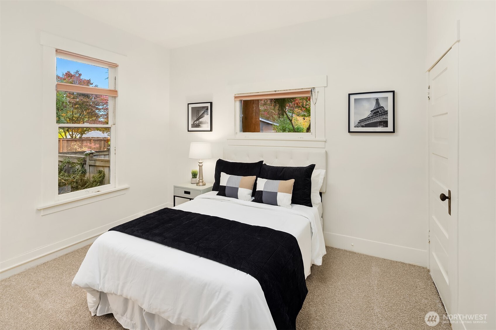 5722 Keystone Place North Seattle, WA 98103 - Photo 18 of 38 a bedroom with a bed and a window