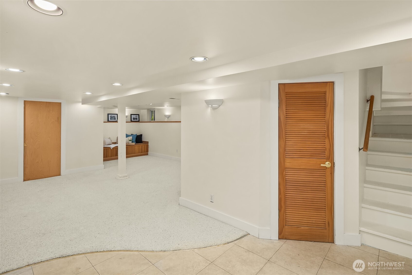 5722 Keystone Place North Seattle, WA 98103 - Photo 26 of 38 a view of a hallway with wooden cabinets
