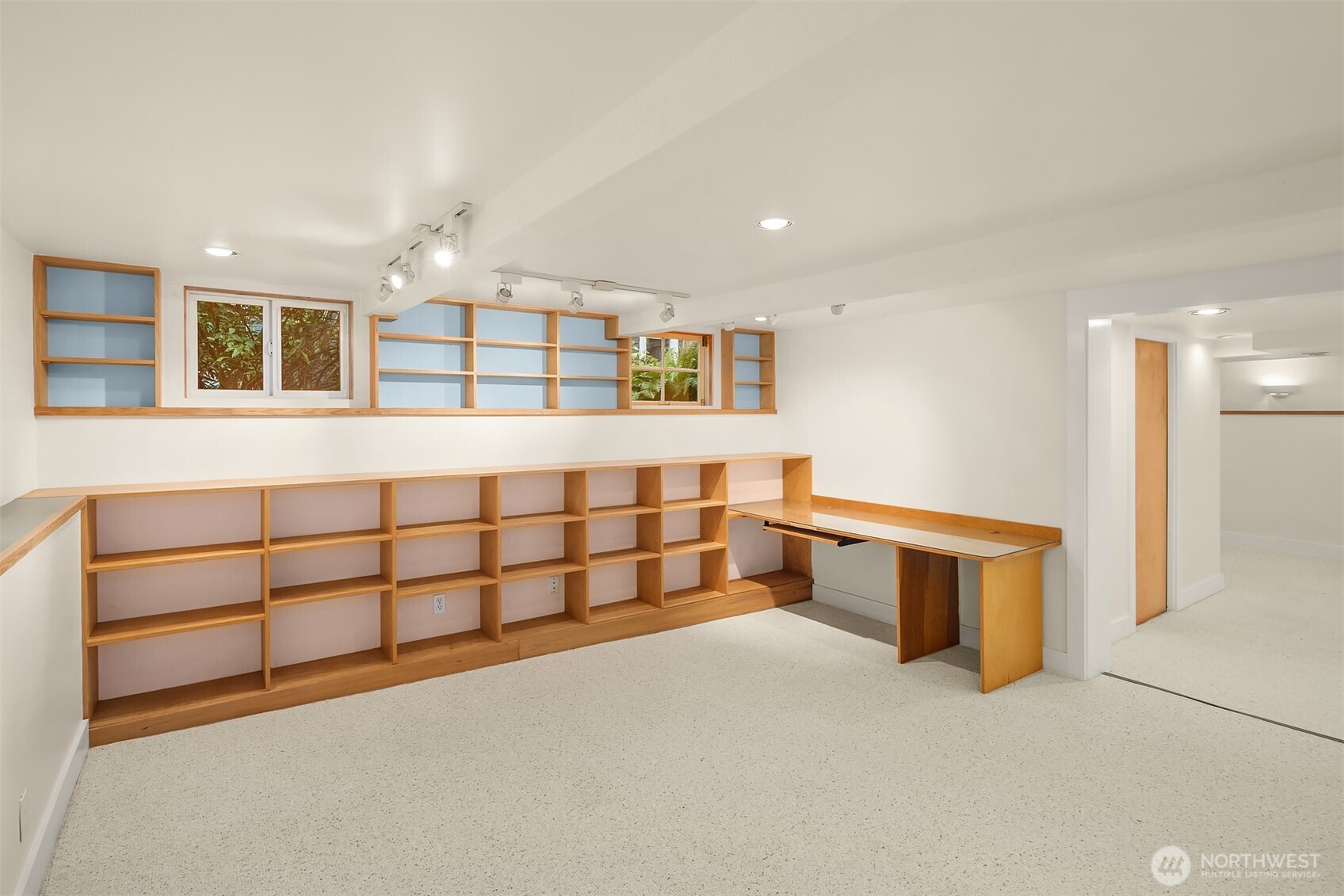 5722 Keystone Place North Seattle, WA 98103 - Photo 28 of 38 a spacious bedroom with a bed and a cabinets
