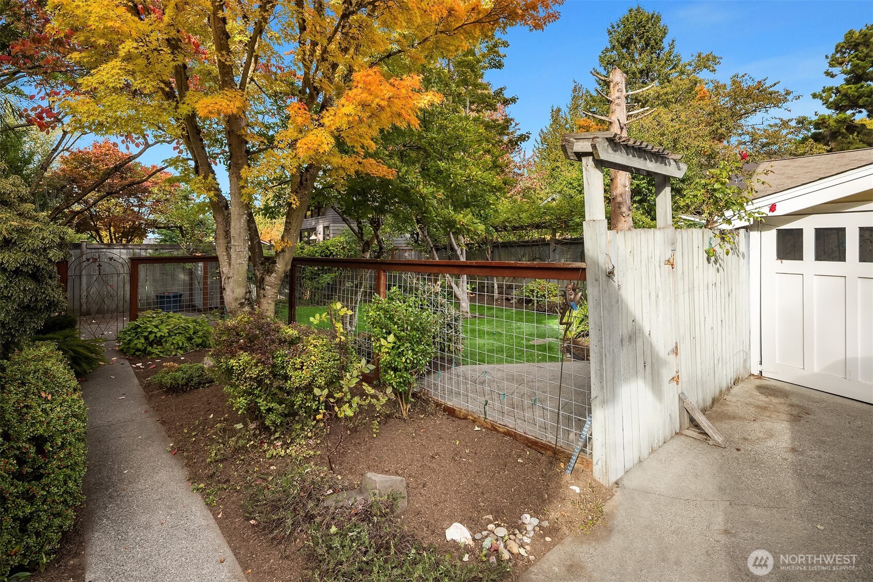 5722 Keystone Place North Seattle, WA 98103 - Photo 32 of 38 a view of a garden with pathway