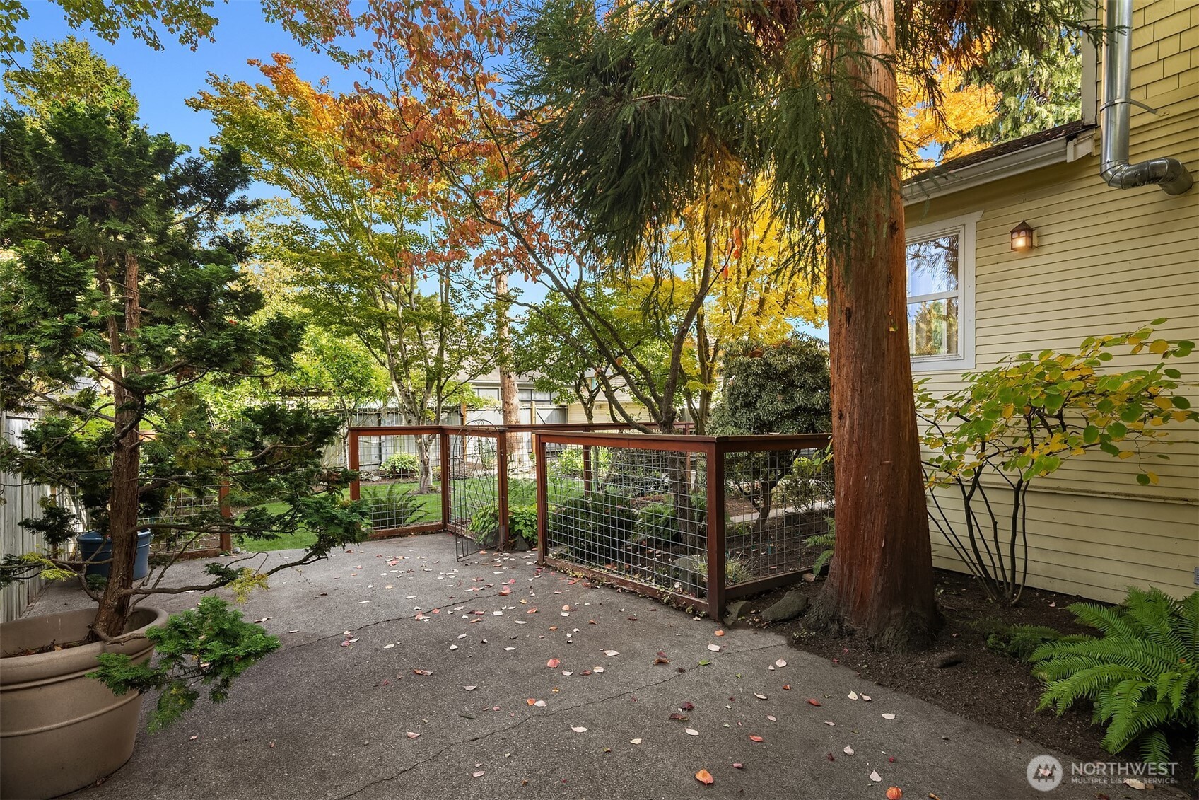5722 Keystone Place North Seattle, WA 98103 - Photo 35 of 38 a view of a house with a yard