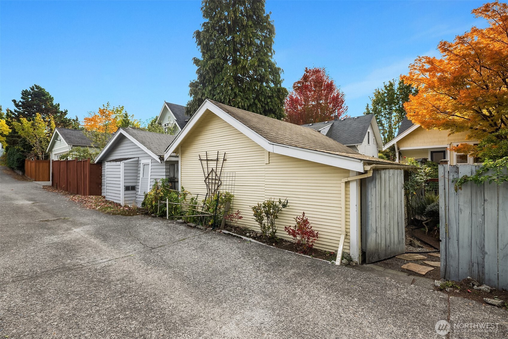 5722 Keystone Place North Seattle, WA 98103 - Photo 37 of 38 a view of a house with a yard and garage