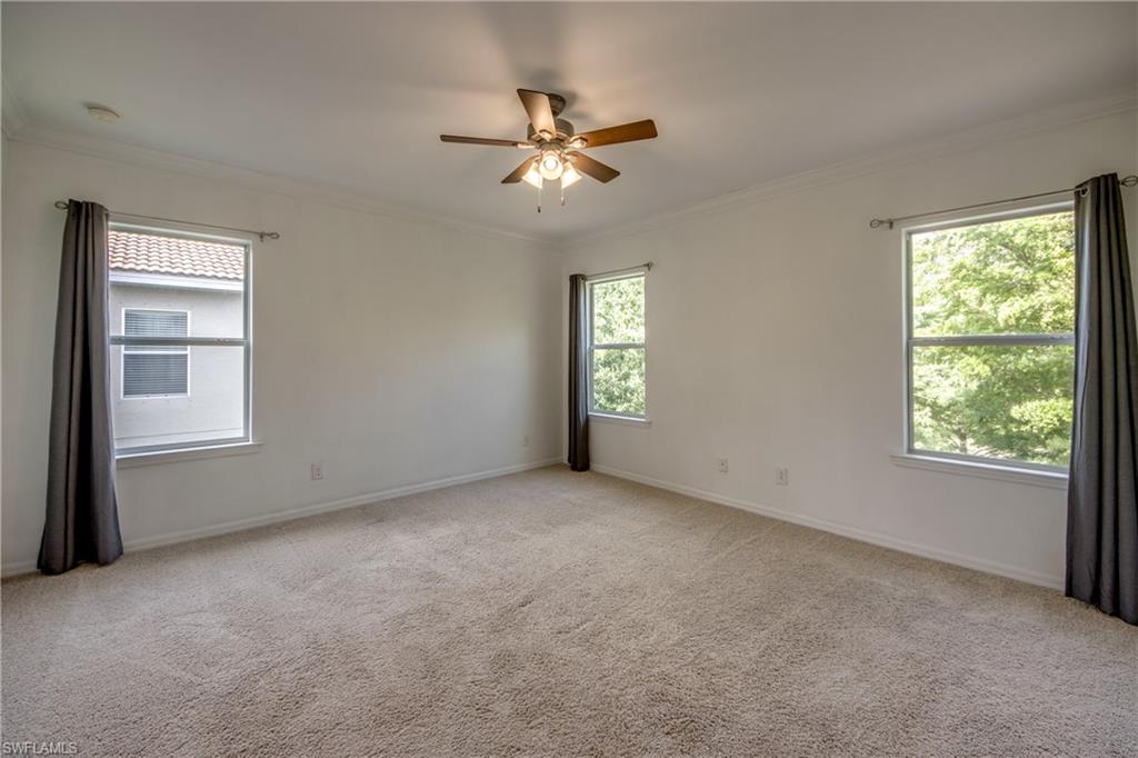 19530 Bowring Park Road, Unit 106 Fort Myers, FL 33967 - Photo 18 of 39 a view of a livingroom with a window