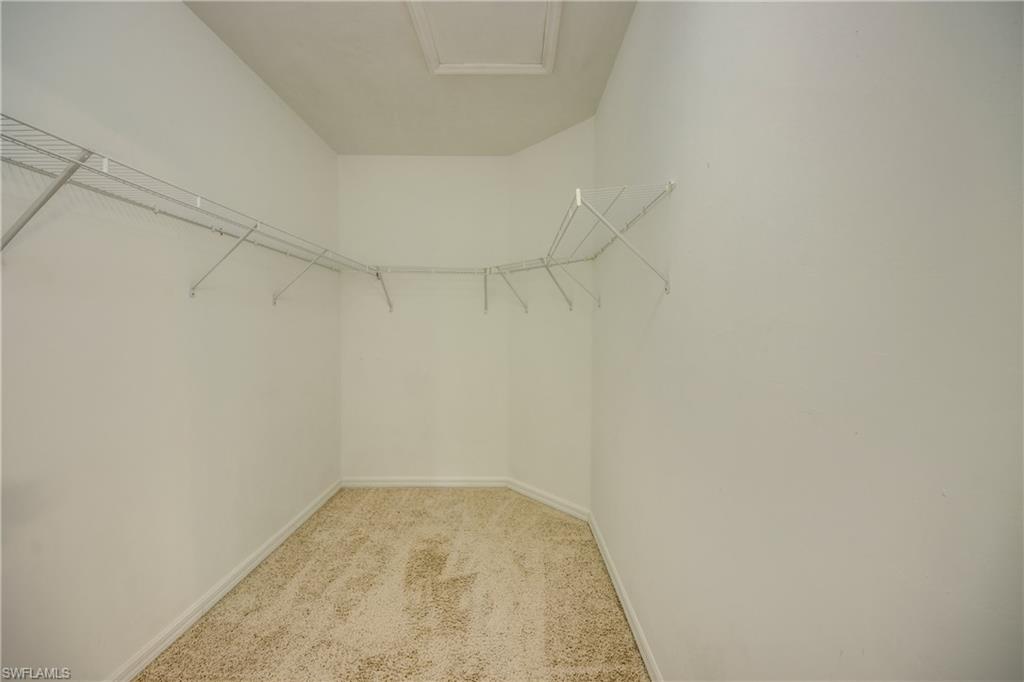 19530 Bowring Park Road, Unit 106 Fort Myers, FL 33967 - Photo 21 of 39 a view of a room with empty racks