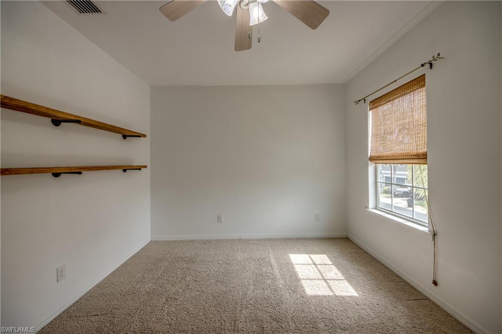 19530 Bowring Park Road, Unit 106 Fort Myers, FL 33967 - Photo 26 of 39 a view of an empty room with a window