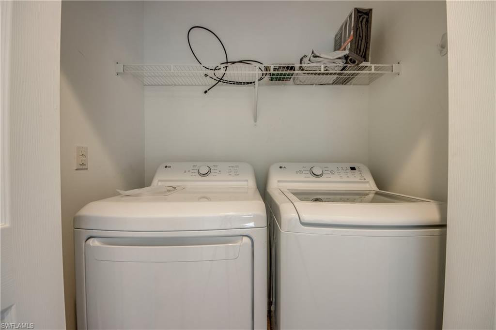 19530 Bowring Park Road, Unit 106 Fort Myers, FL 33967 - Photo 28 of 39 a utility room with dryer and washer