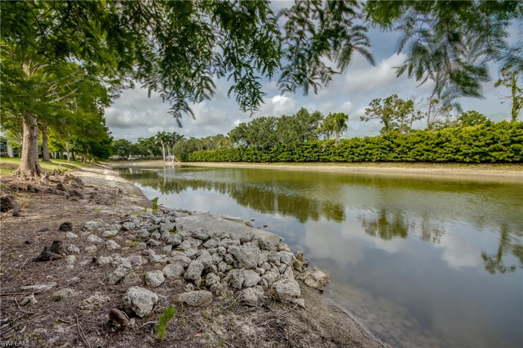 19530 Bowring Park Road, Unit 106 Fort Myers, FL 33967 - Photo 34 of 39 a view of a lake with a mountain