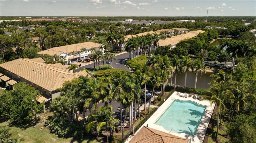 19530 Bowring Park Road, Unit 106 Fort Myers, FL 33967 - Photo 38 of 39 an aerial view of a residential houses with city view