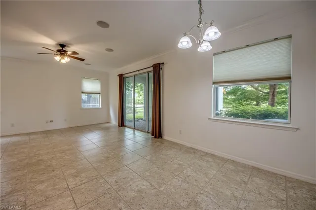 wooden floor with a window in a room