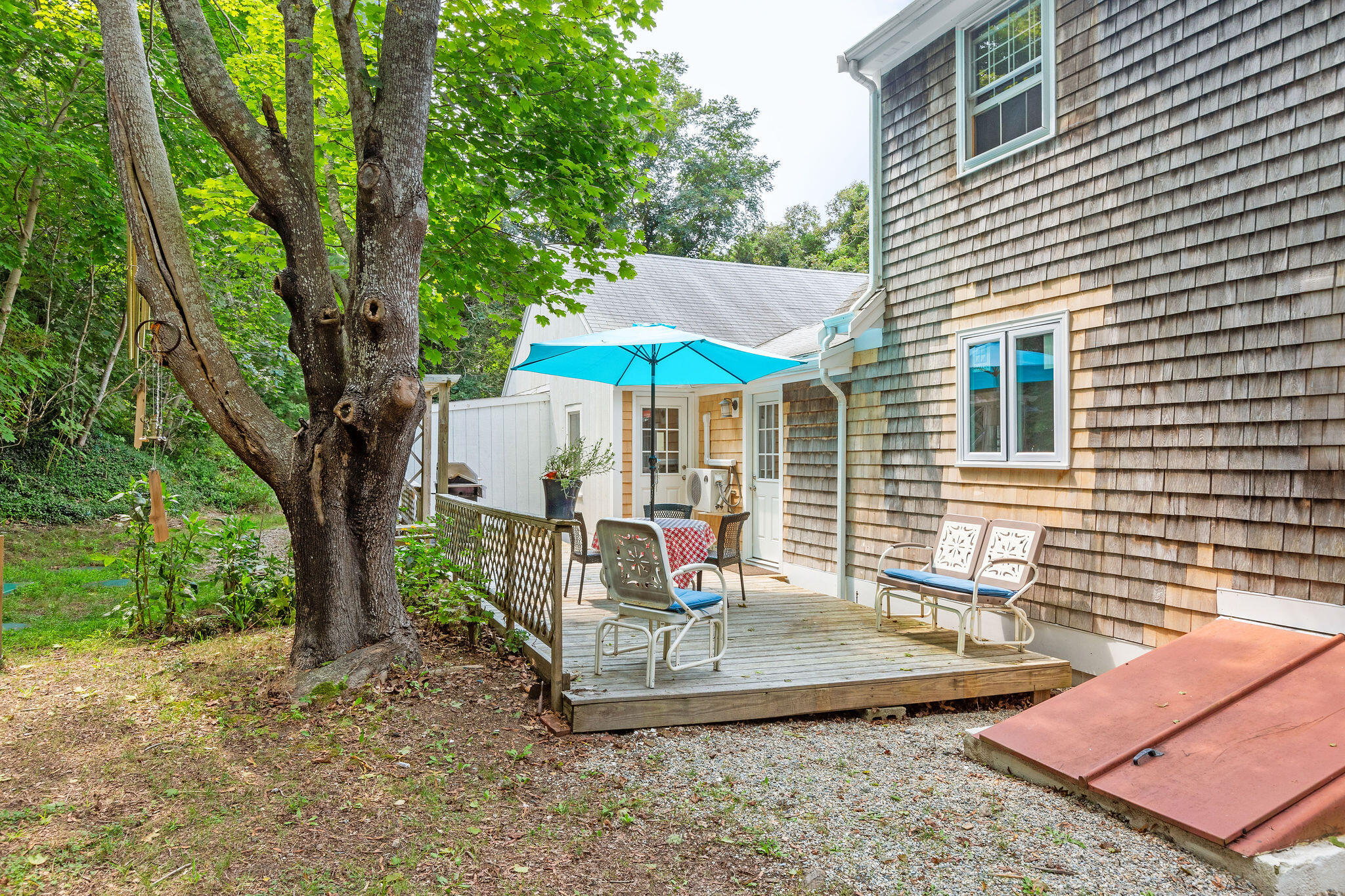 9 South Highland Road Truro, MA 02666 - Photo 23 of 32 a view of a house with backyard and sitting area