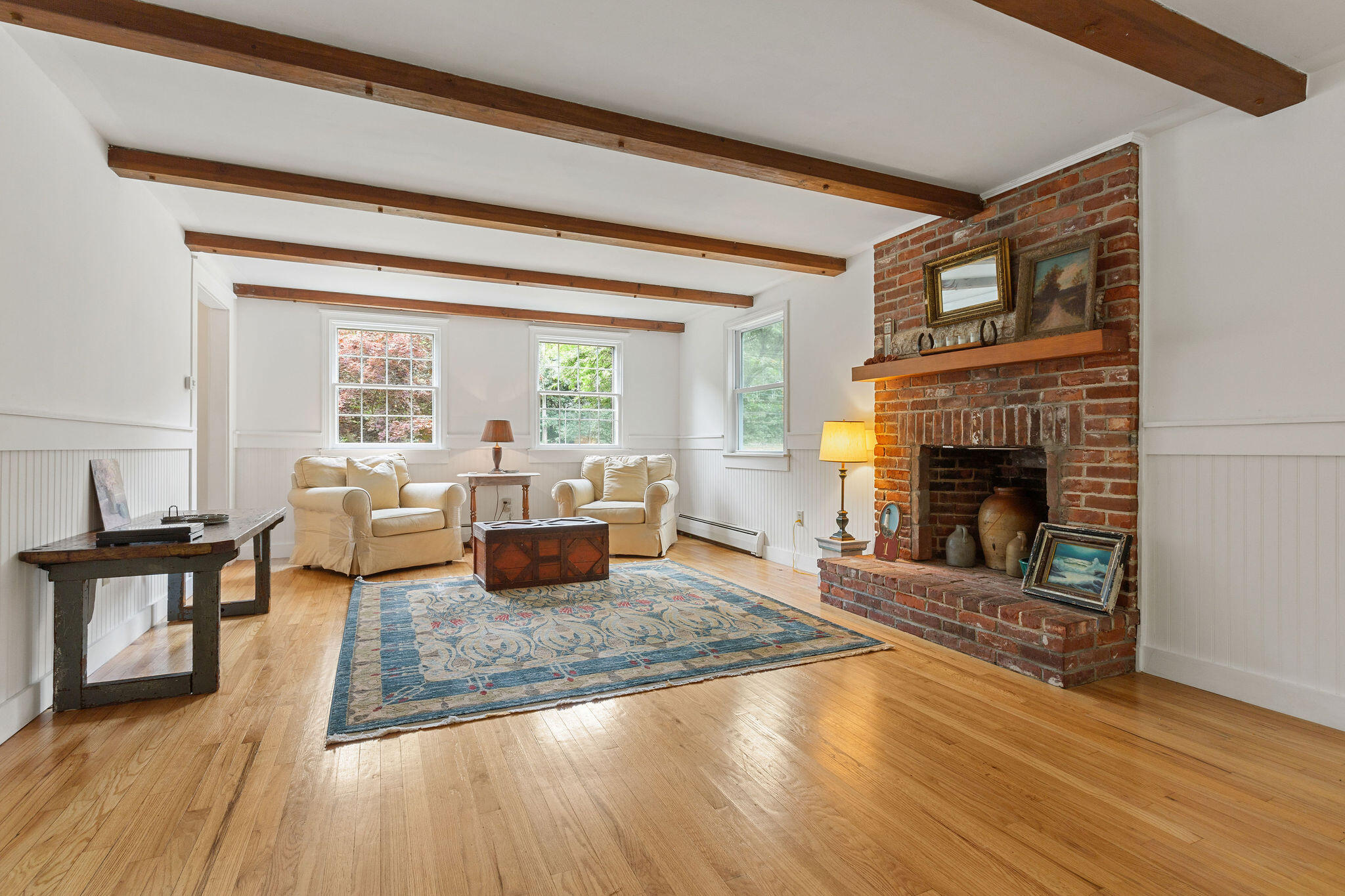 9 South Highland Road Truro, MA 02666 - Photo 3 of 32 a living room with furniture and a fireplace