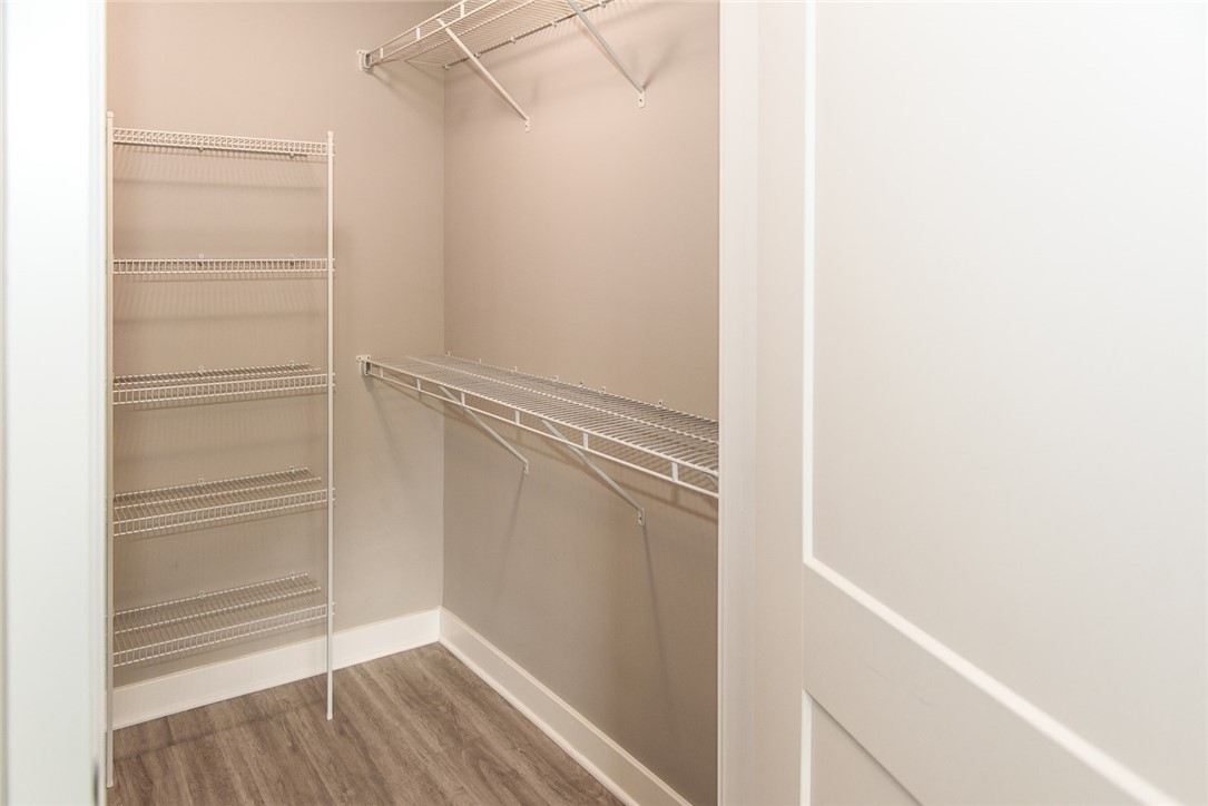 502 New Terrace Lane Ogden, NY 14624 - Photo 13 of 27 View of typical primary bedroom walk-in closet