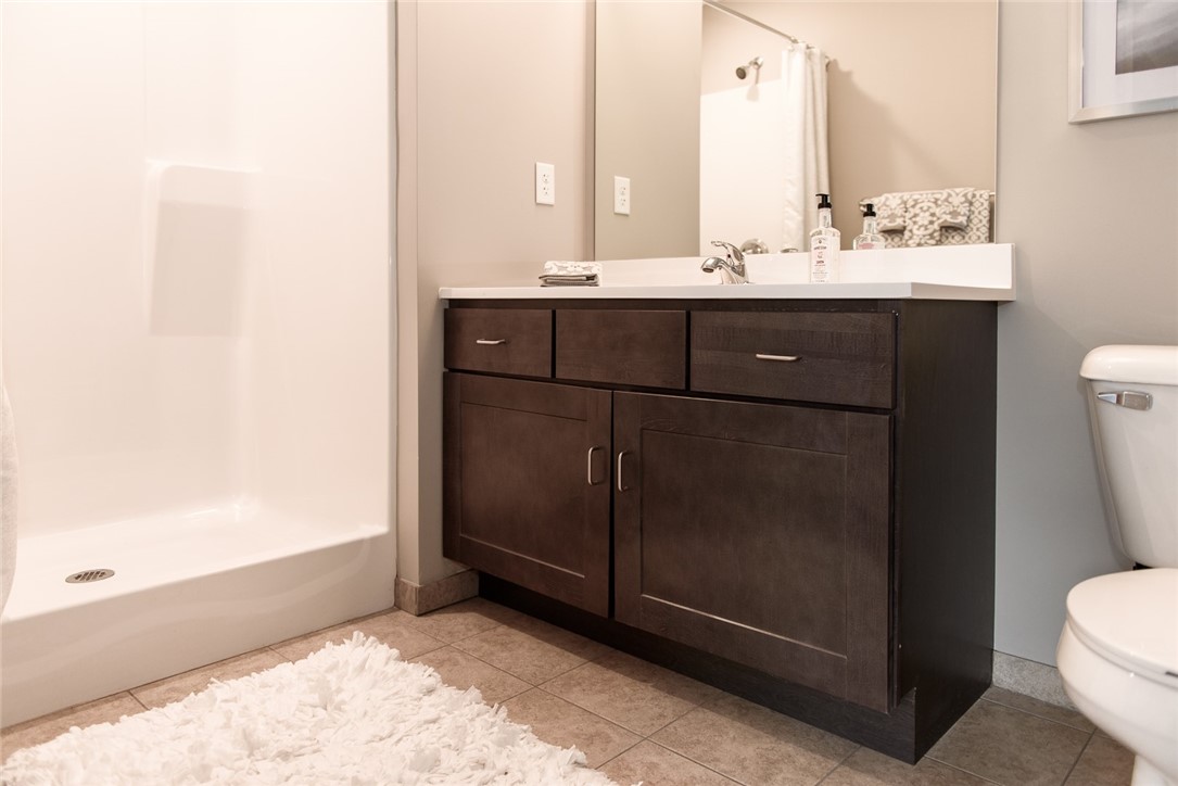 502 New Terrace Lane Ogden, NY 14624 - Photo 14 of 27 Typical full bathroom with step-in shower