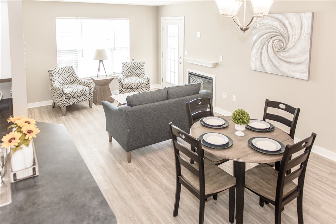 502 New Terrace Lane Ogden, NY 14624 - Photo 3 of 27 Typical great room dining area