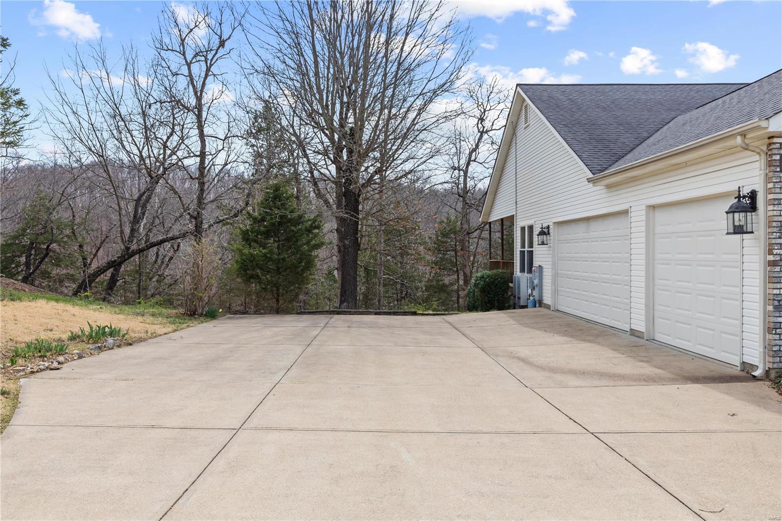 3885 Olde Mill Drive Byrnes Mill, MO 63051 - Photo 4 of 51