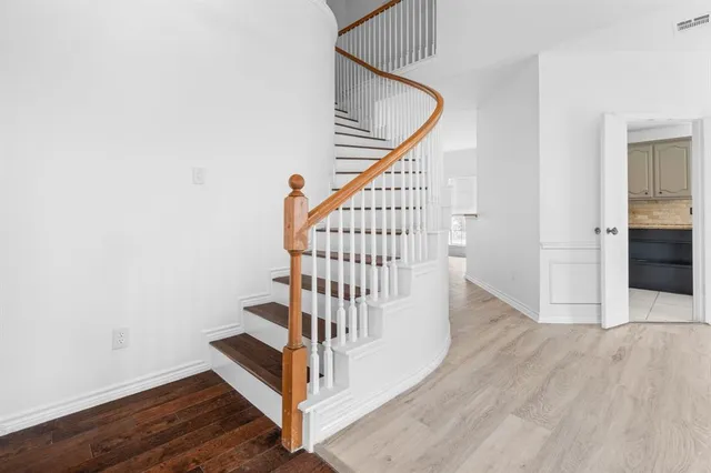 a view of entryway with wooden floor