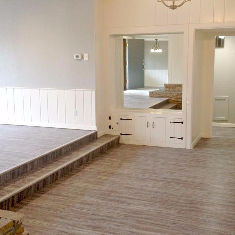3313 45th Street Lubbock, TX 79413 - Photo 7 of 10 a view of an empty room with window and wooden floor