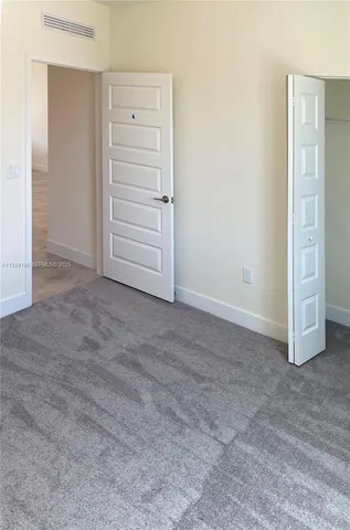 a view of a patio with swimming pool