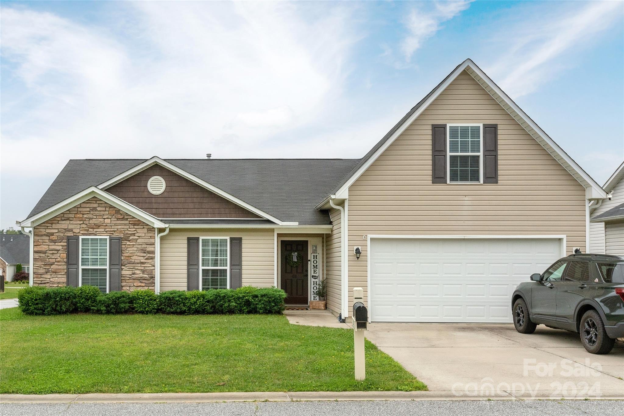 48 East Hiawassee Road Fletcher, NC 28732 - Photo 1 of 20 a house view with a garden space