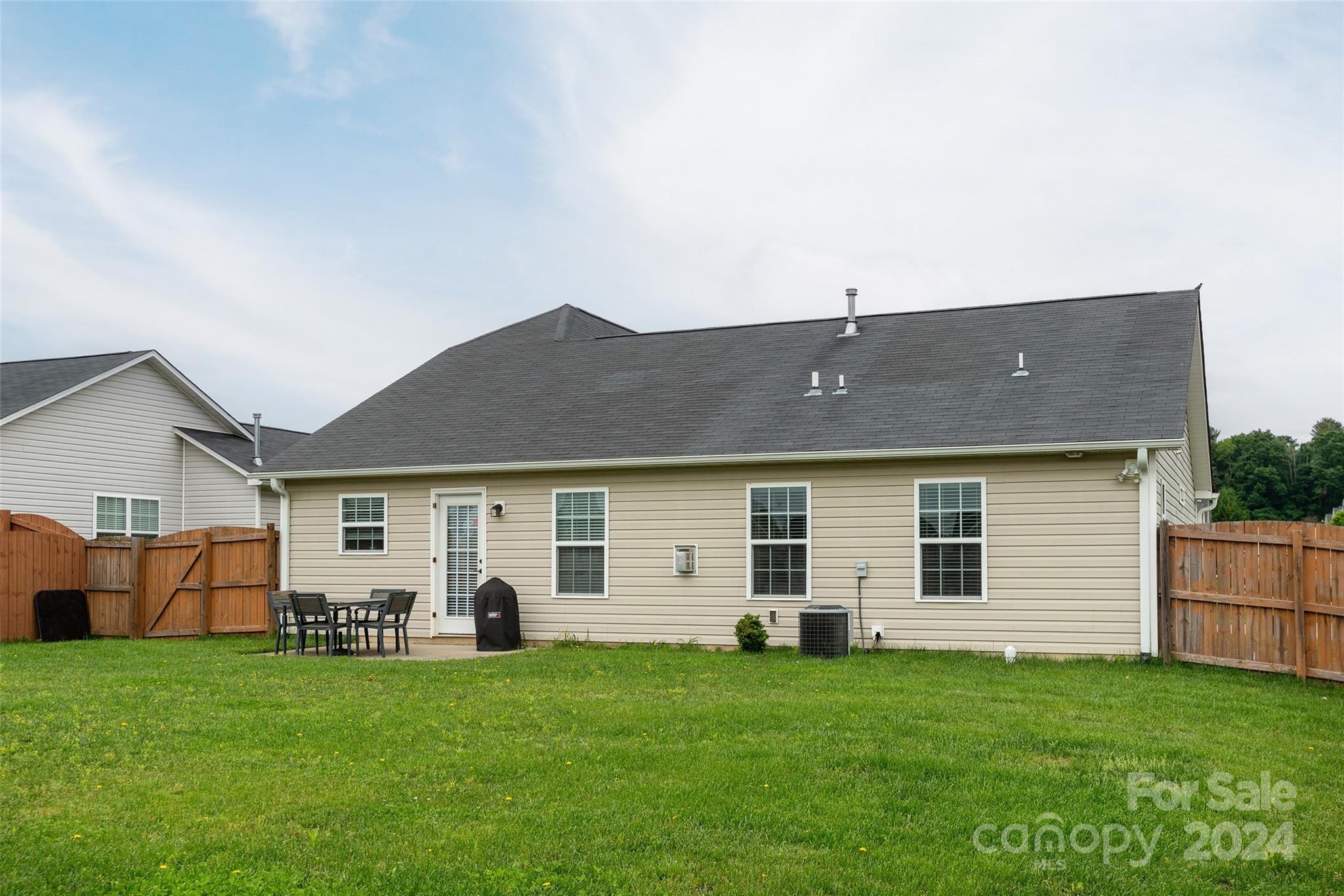 48 East Hiawassee Road Fletcher, NC 28732 - Photo 19 of 20 a front view of house with yard and green space