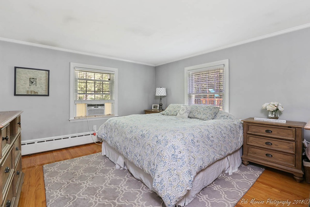 5 Cedarview Road Ipswich, MA 01938 - Photo 14 of 30 a bedroom with a bed and a window