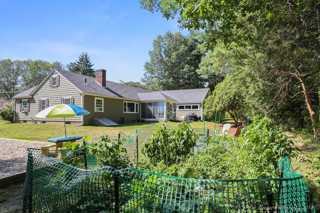 5 Cedarview Road Ipswich, MA 01938 - Photo 26 of 30 a front view of a house with a swimming pool