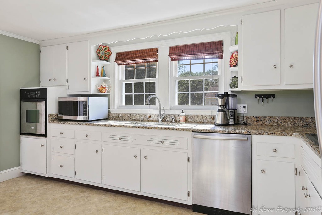 5 Cedarview Road Ipswich, MA 01938 - Photo 5 of 30 a kitchen with granite countertop white cabinets and sink