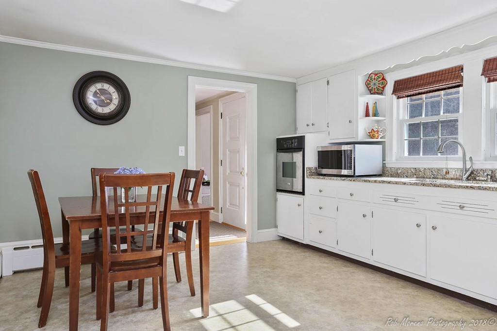 5 Cedarview Road Ipswich, MA 01938 - Photo 7 of 30 a view of a dining room with furniture and a large window