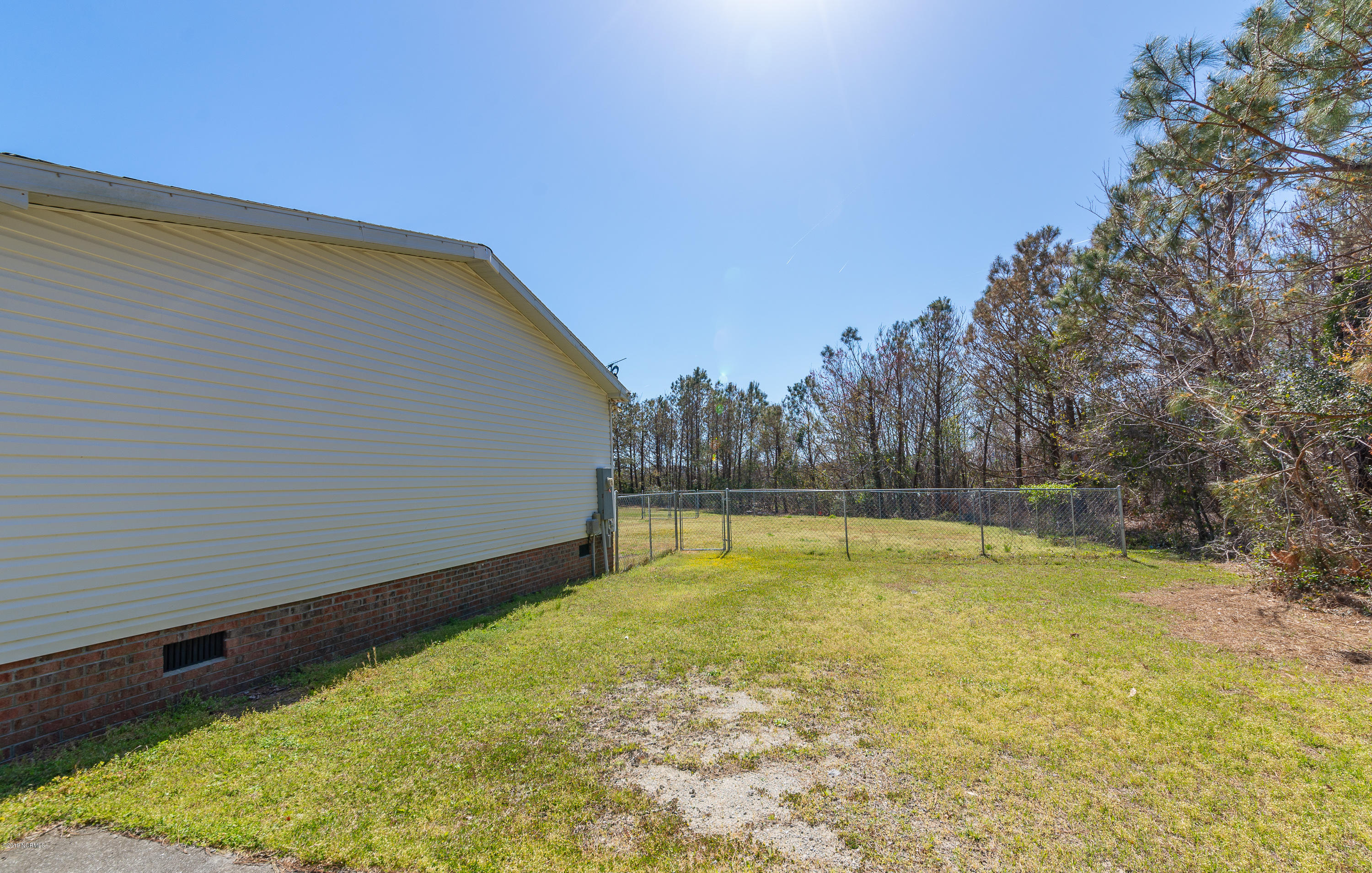 410 Moores Landing Road Hampstead, NC 28443 - Photo 23 of 26 Side Elevation