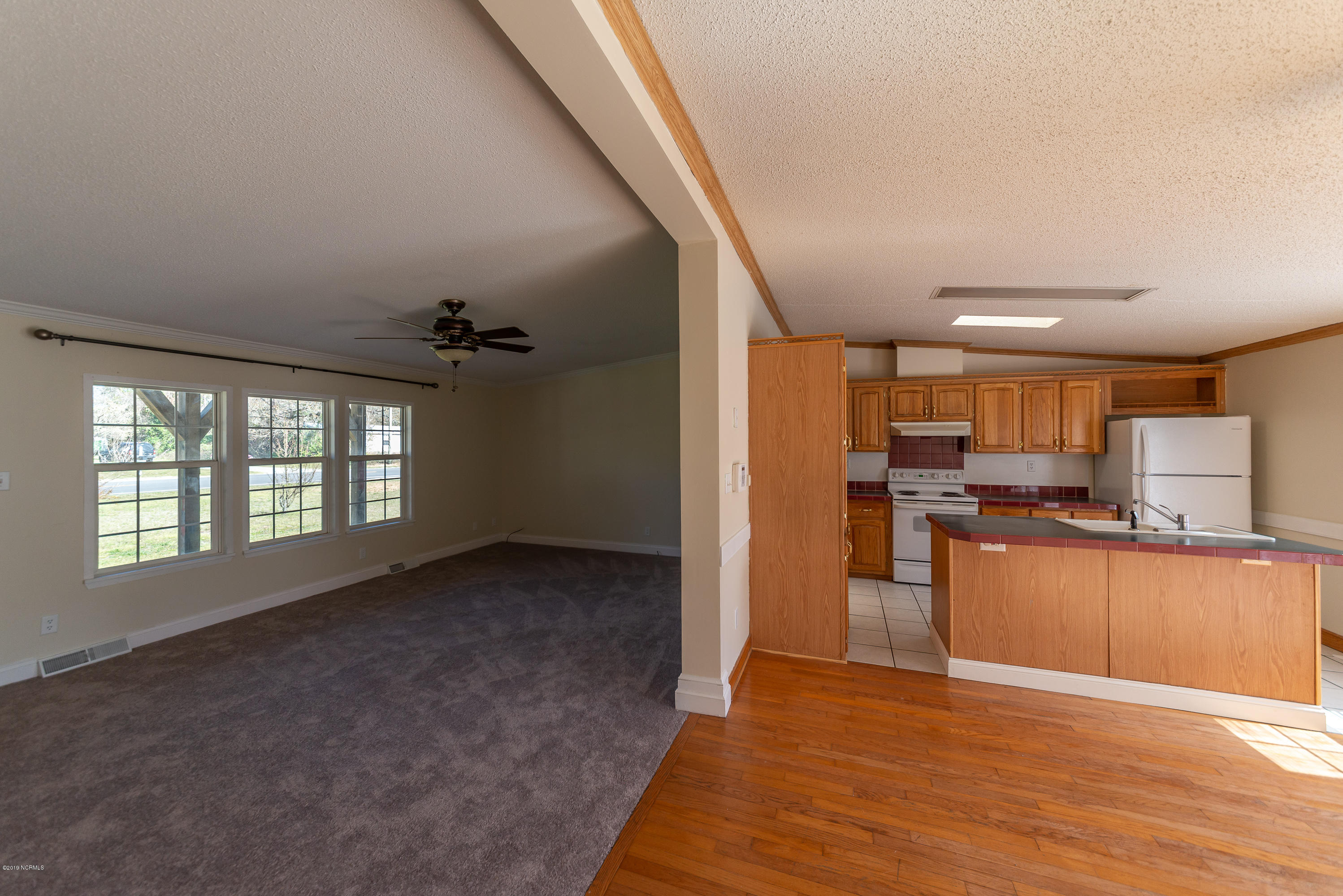 410 Moores Landing Road Hampstead, NC 28443 - Photo 4 of 26 Kitchen and Livingroom