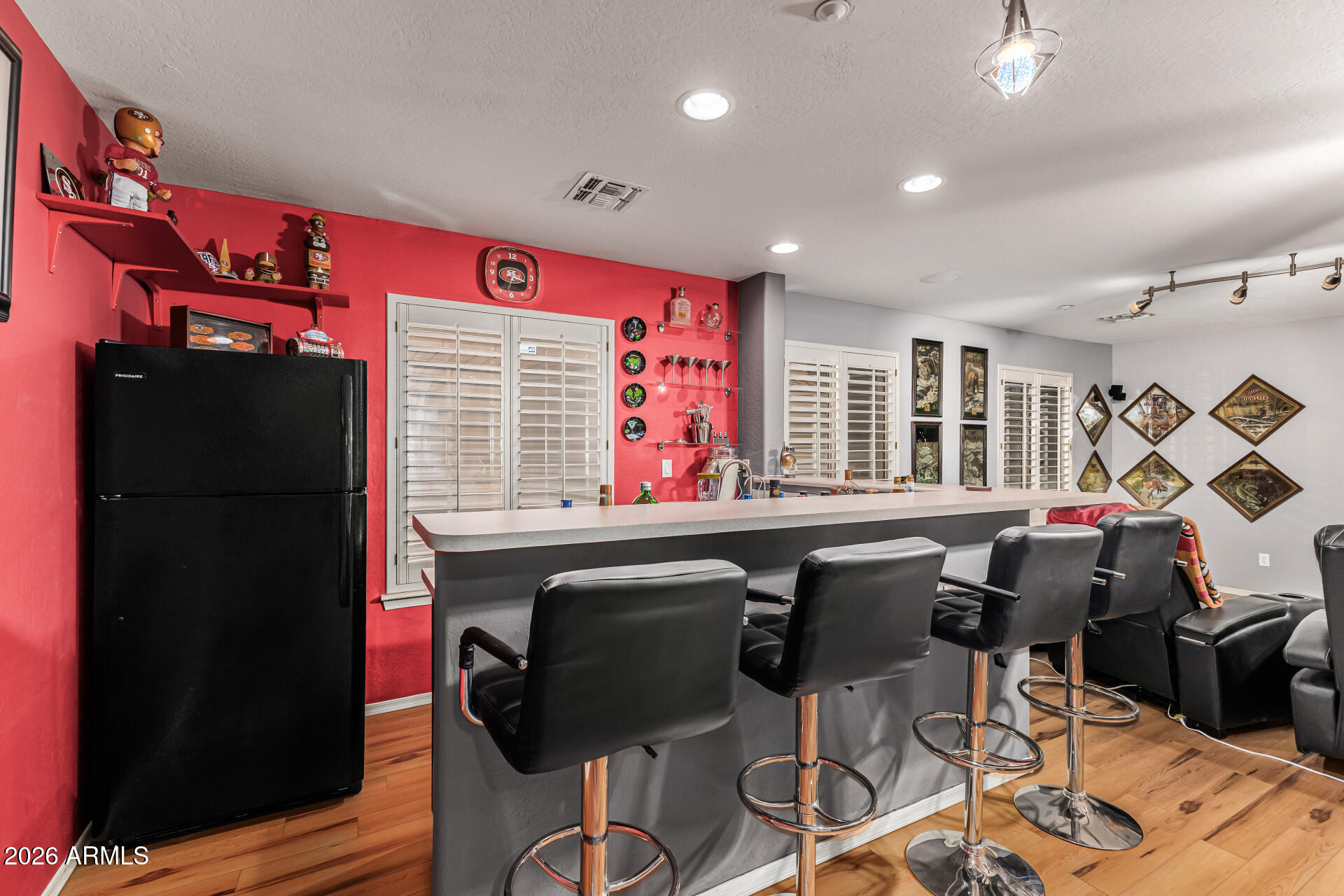 6829 West Briles Road Peoria, AZ 85383 - Photo 42 of 61 a view of a dining room with furniture and a window