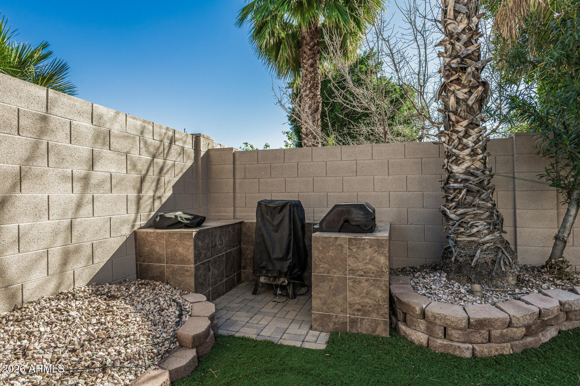6829 West Briles Road Peoria, AZ 85383 - Photo 48 of 61 a backyard of a house with seating space