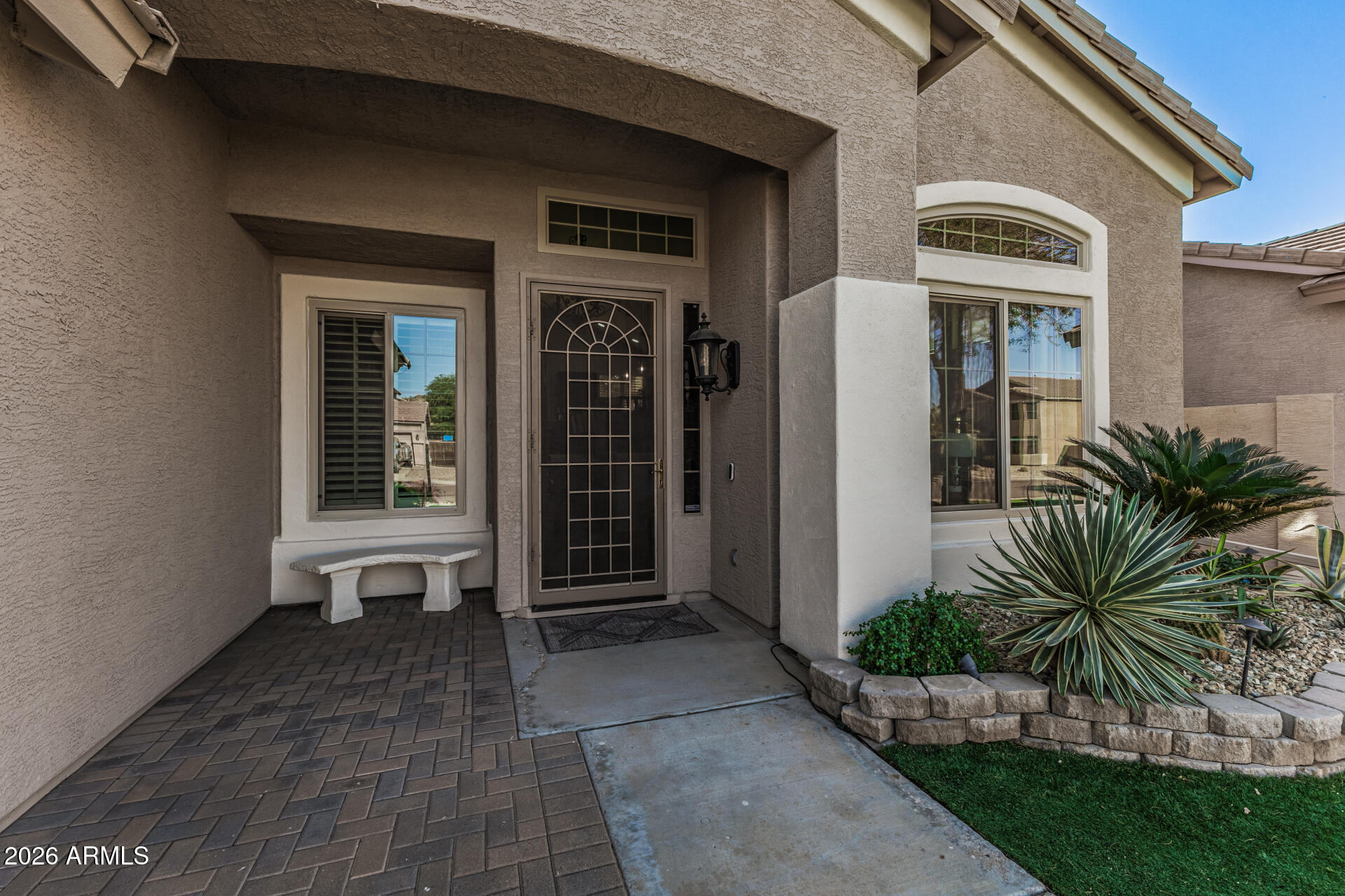 6829 West Briles Road Peoria, AZ 85383 - Photo 5 of 61 a front view of a house with a yard