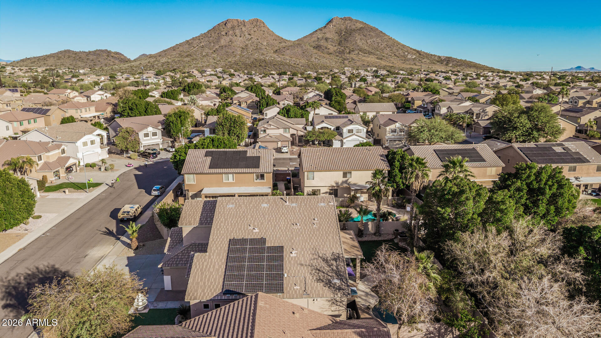 6829 West Briles Road Peoria, AZ 85383 - Photo 54 of 61 an aerial view of residential houses with outdoor space