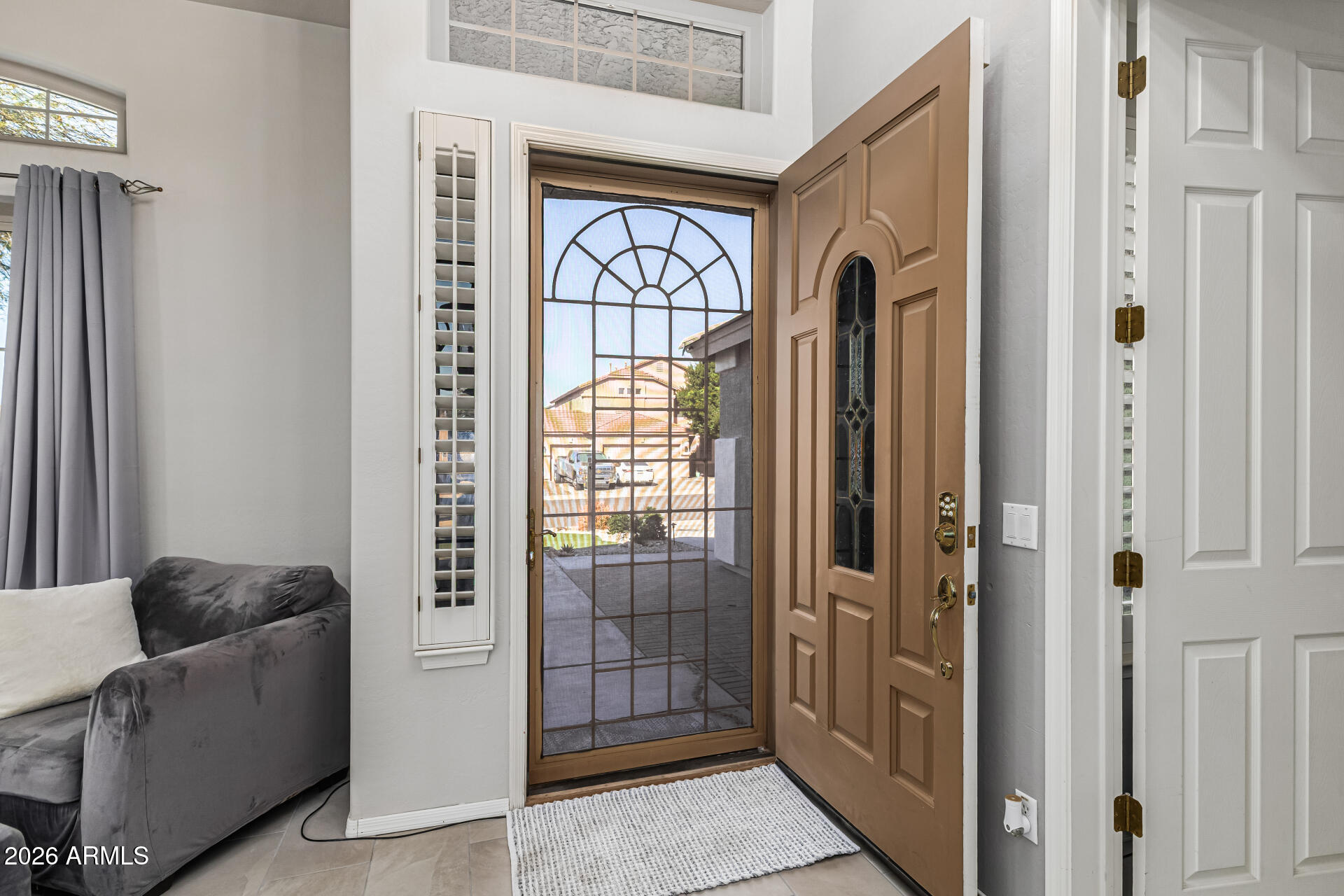 6829 West Briles Road Peoria, AZ 85383 - Photo 6 of 61 a livingroom with furniture and a window