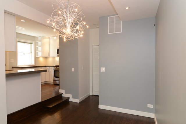 Undisclosed Address Chicago, IL 60614 - Photo 5 of 17 wooden floor in a room with a window