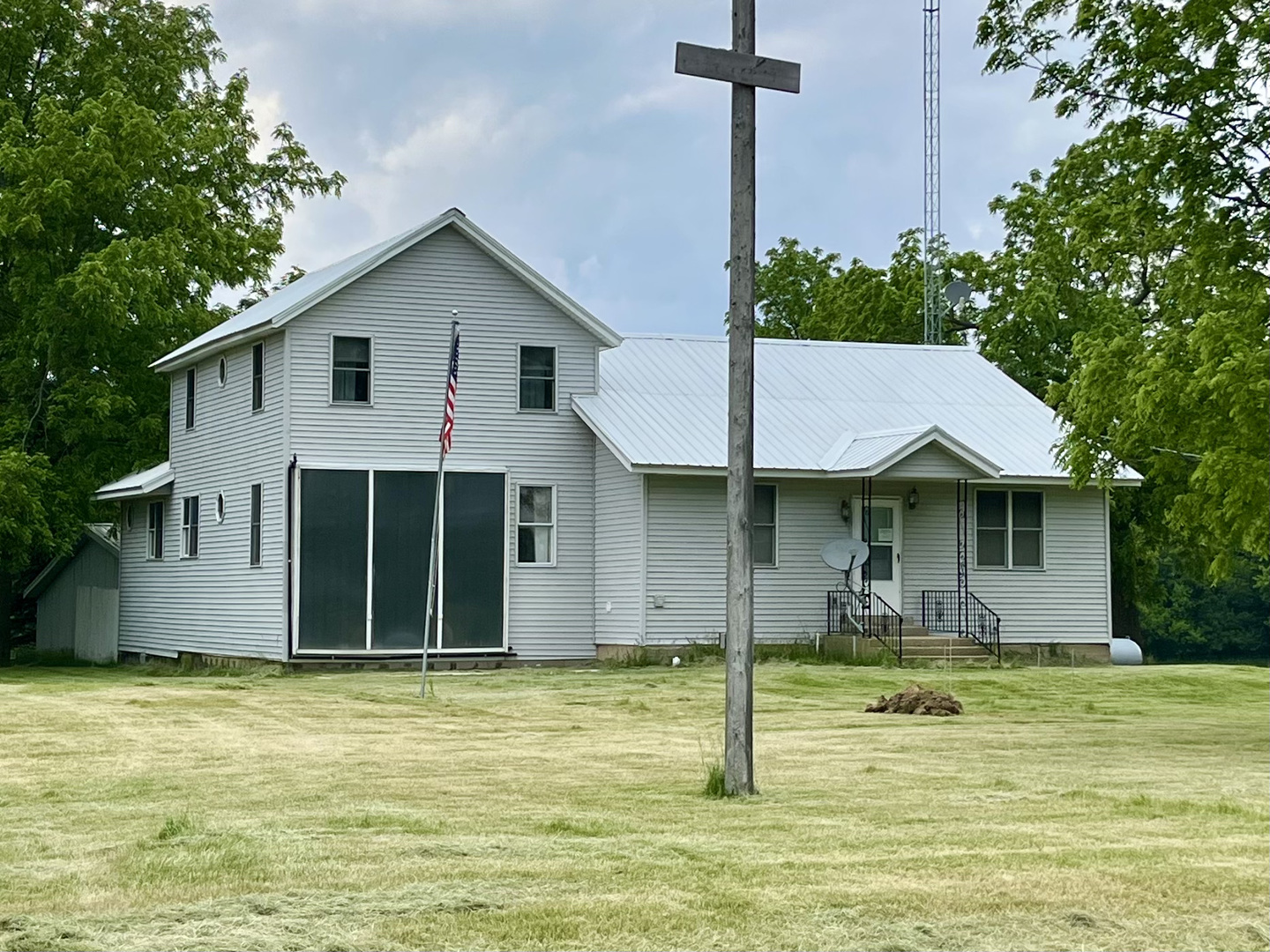 3420 Howlett Road Paw Paw, IL 61353 - Photo 1 of 34 a front view of a house with a yard