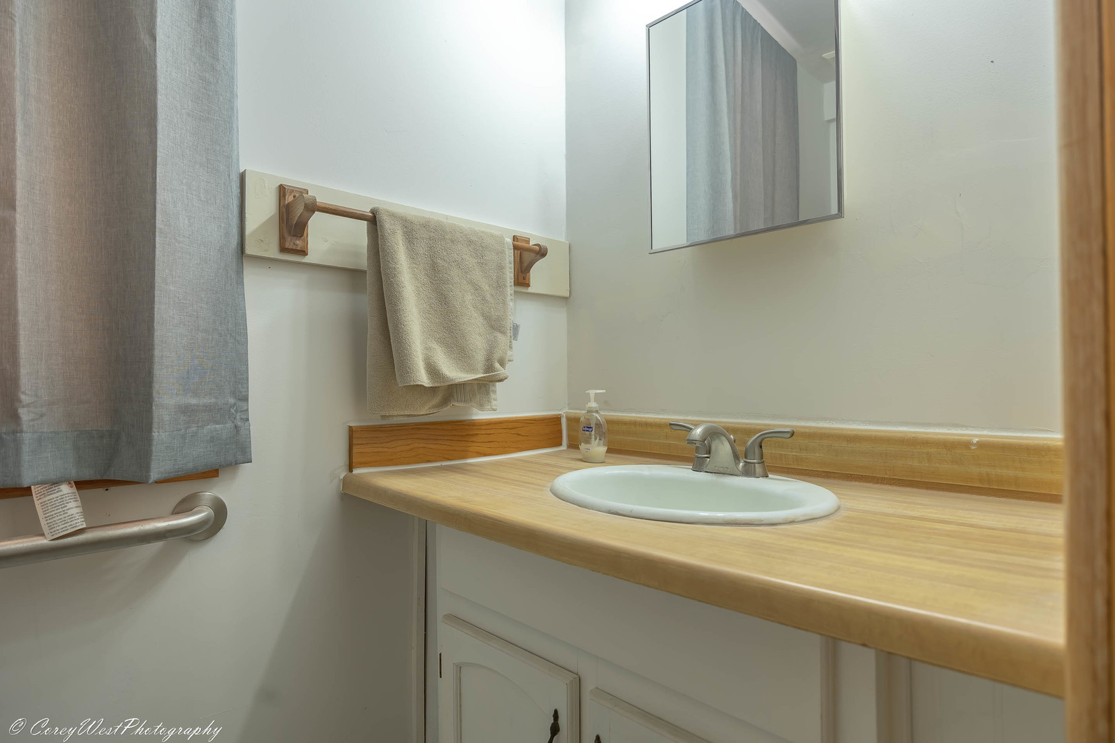 3420 Howlett Road Paw Paw, IL 61353 - Photo 15 of 34 a bathroom with a sink and a mirror