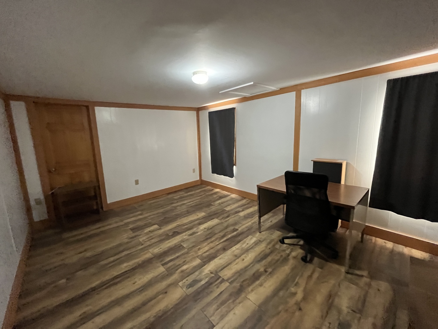 3420 Howlett Road Paw Paw, IL 61353 - Photo 20 of 34 a view of a big room with wooden floor and furniture