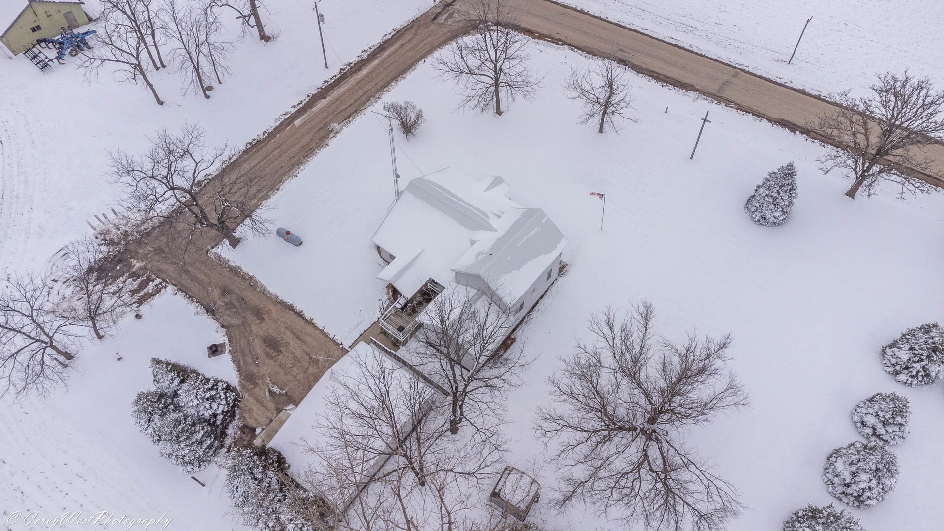3420 Howlett Road Paw Paw, IL 61353 - Photo 29 of 34 a view of a house with a snow on the wall