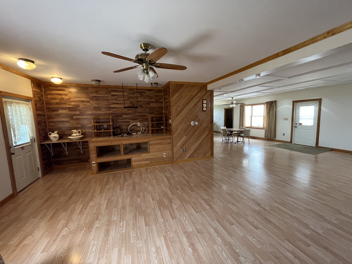 3420 Howlett Road Paw Paw, IL 61353 - Photo 5 of 34 a big room with wooden floor and windows