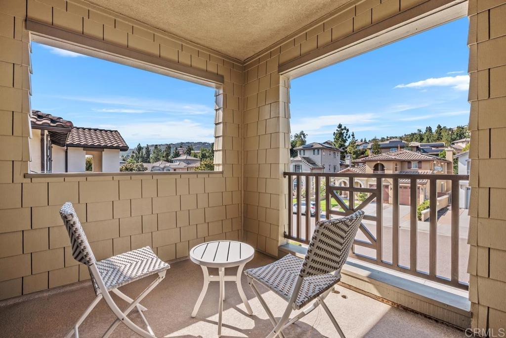 923 Citrine Way San Marcos, CA 92078 - Photo 32 of 47 a view of a balcony with chairs