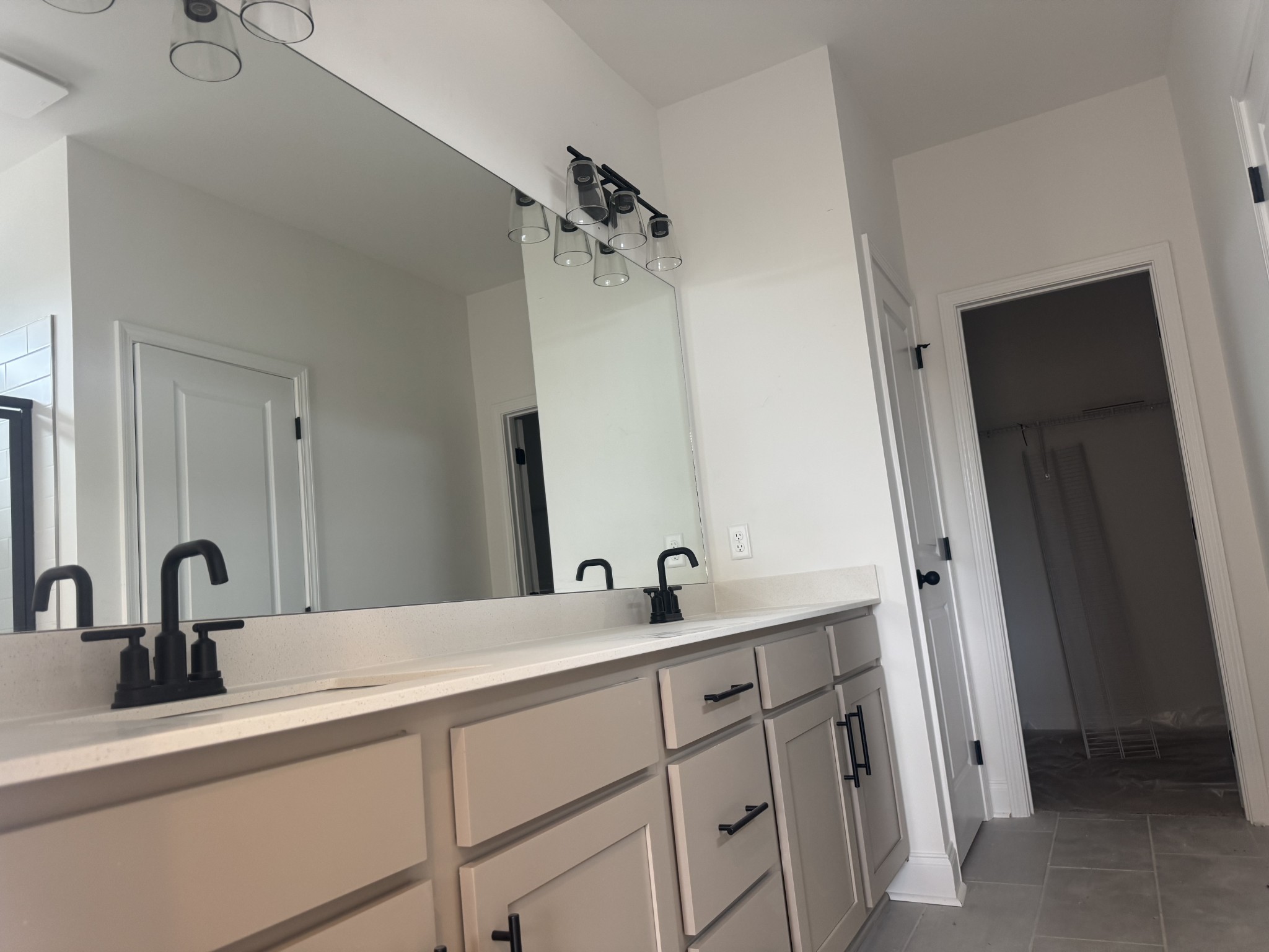 235 Limestone Way Mount Juliet, TN 37122 - Photo 37 of 45 a bathroom with a sink and a mirror