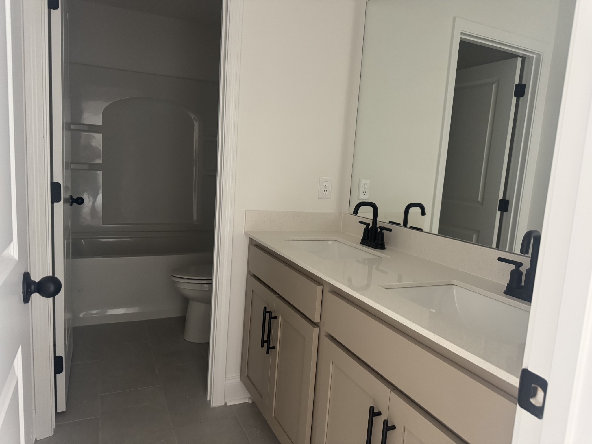 235 Limestone Way Mount Juliet, TN 37122 - Photo 7 of 45 a bathroom with a sink a toilet and shower