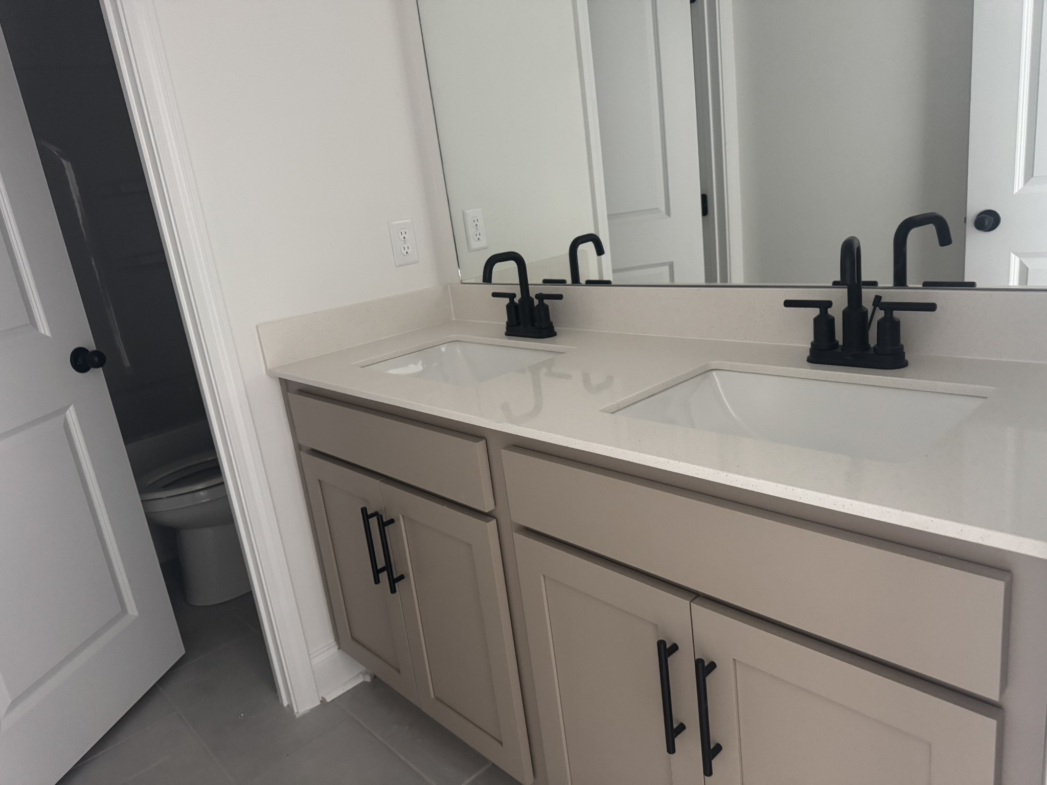 235 Limestone Way Mount Juliet, TN 37122 - Photo 8 of 45 a bathroom with a sink and a mirror