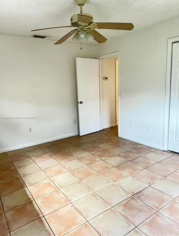 a view of a room with an empty space