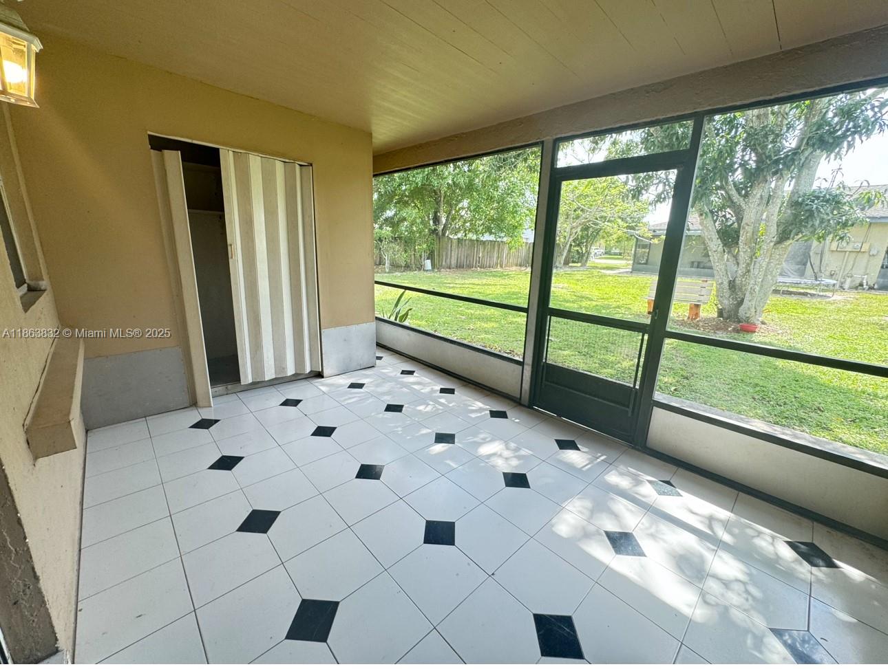 1327 Riverside Circle, Unit 1327 Wellington, FL 33414 - Photo 18 of 20 a view of a black and white floor