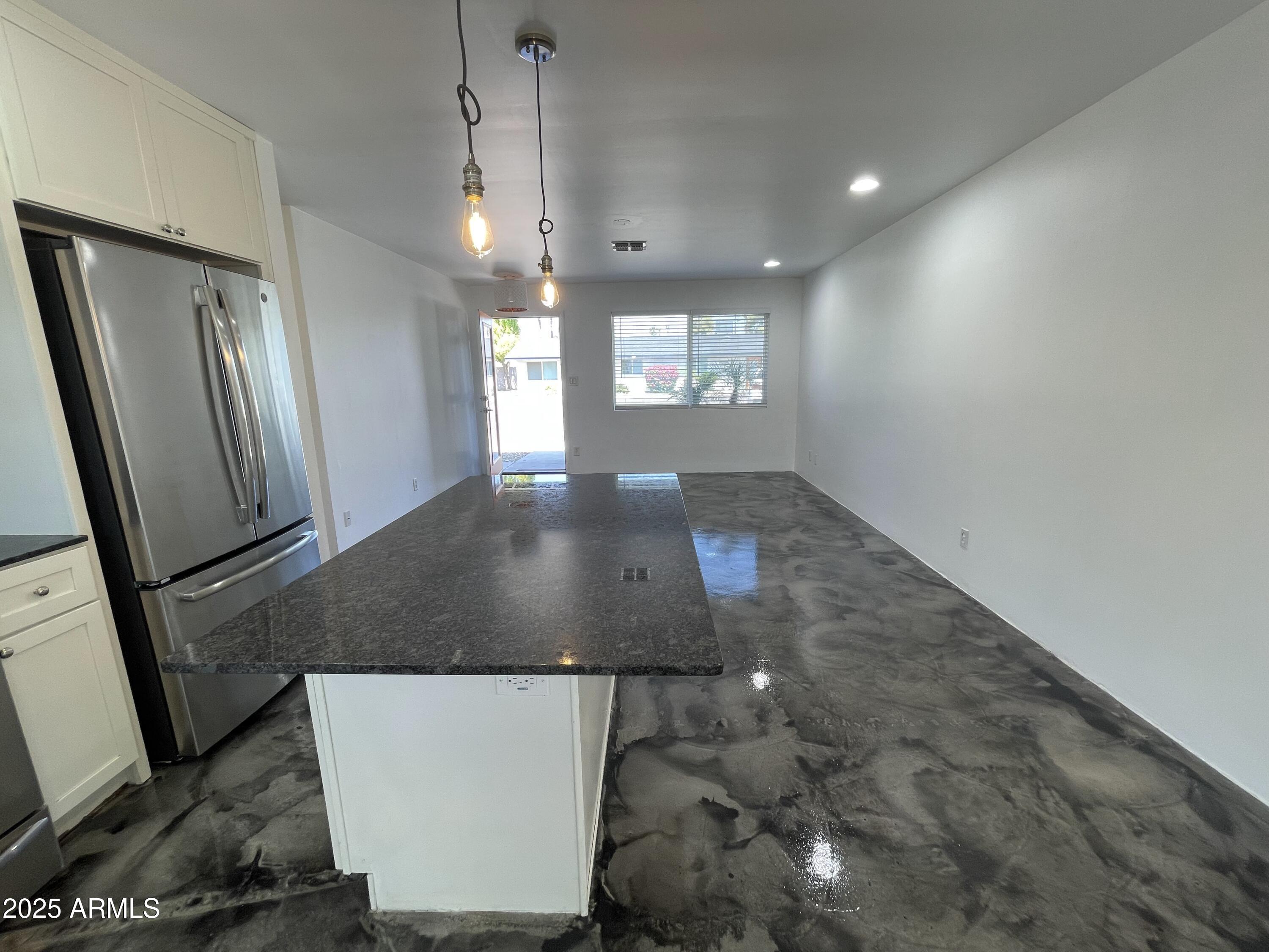 3416 North 37th Street, Unit 3 Phoenix, AZ 85018 - Photo 6 of 22 a view of a hallway with window