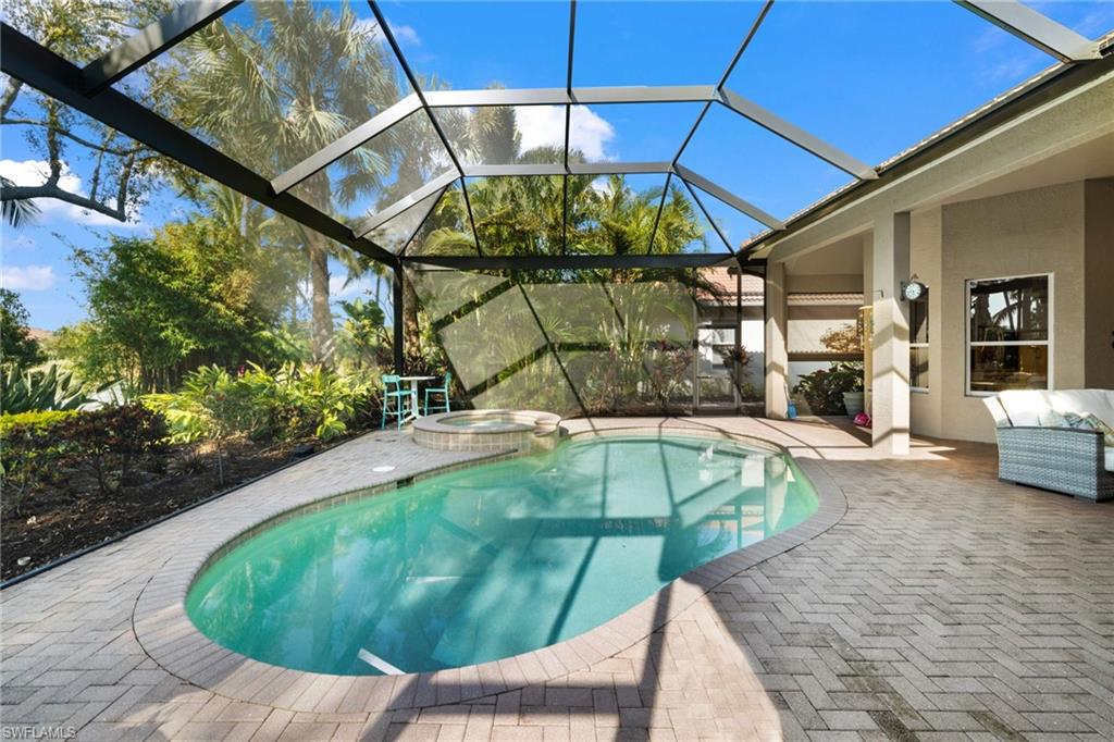 20196 Markward Crossing Estero, FL 33928 - Photo 11 of 42 a view of a backyard with swimming pool