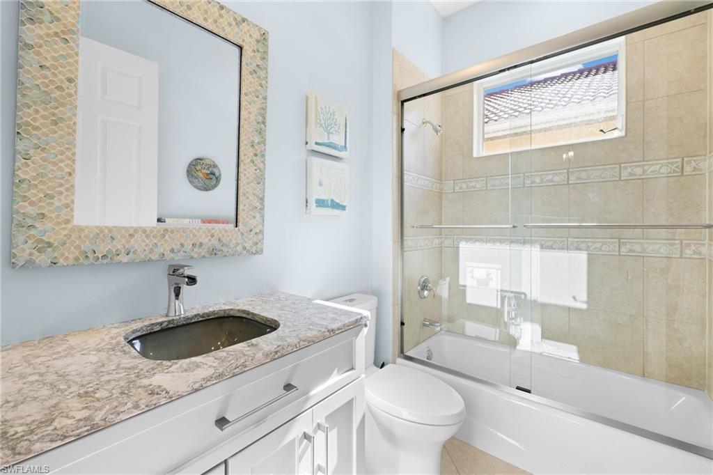 20196 Markward Crossing Estero, FL 33928 - Photo 23 of 42 a bathroom with a sink and a mirror